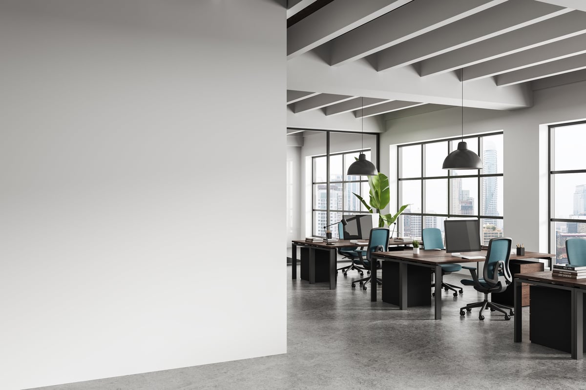 Contemporary office interior with clean empty wall