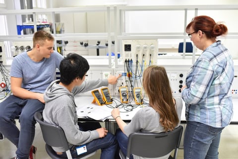 Technical vocational training in industry: young apprentices and trainers in the classroom